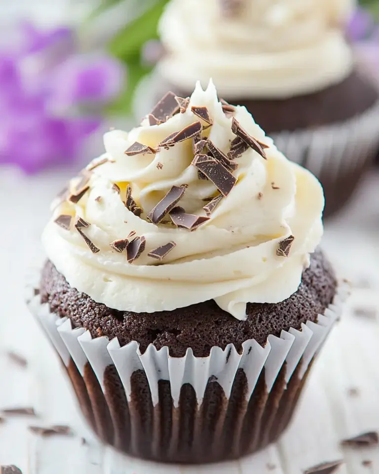 Homemade Dark Chocolate Cupcakes with White Chocolate Frosting photo