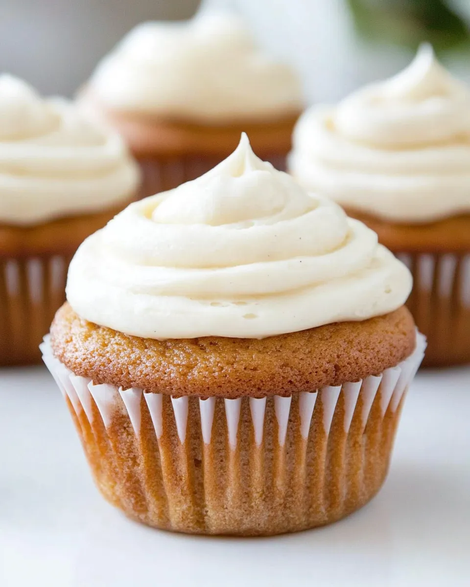 Homemade Honey Cupcakes with Vanilla Frosting photo